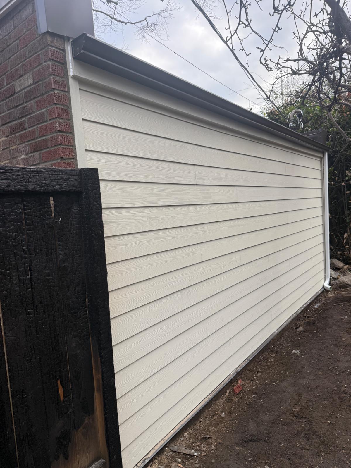 After - Brand new siding installation