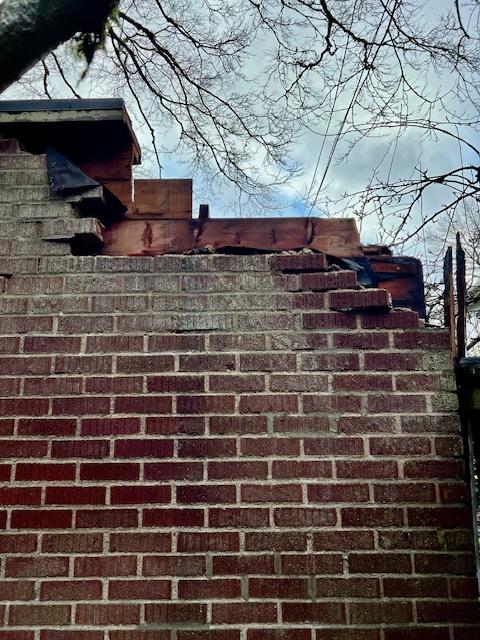 Before - Damaged chimney cap with exposed wood