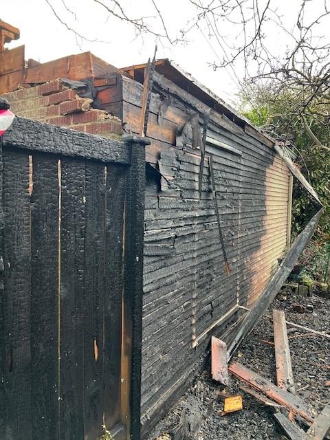 Before - Severe fire damage to siding